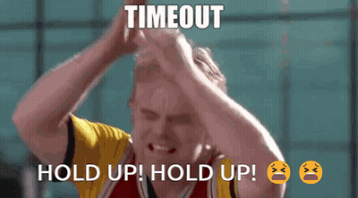 A Man In A Red And Yellow Jersey Says Hold Up GIF