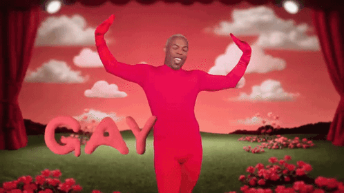 A Man In A Red Bodysuit Is Dancing With The Word Gay Written In Red Letters GIF