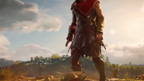 A Man In A Red Cape Stands In A Field With A Helmet On The Ground GIF