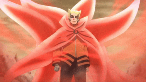 A Man In A Red Cape Stands In Front Of A Large Red Flower GIF
