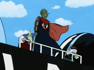 A Man In A Red Cape With The Letter A On His Chest GIF