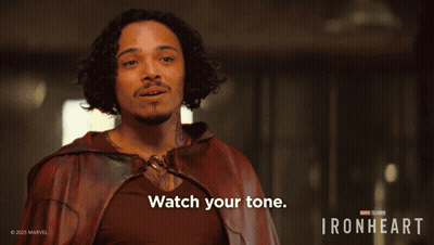 A Man In A Red Cape With The Words Watch Your Tone On The Bottom GIF