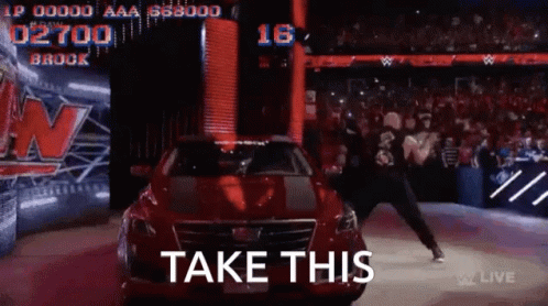 A Man In A Red Car Says Take This GIF