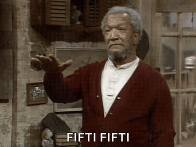 A Man In A Red Cardigan Says Fifti Fifti In Front Of A Window GIF