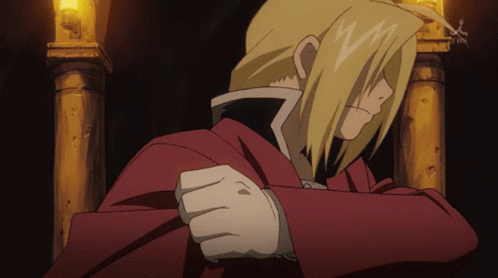 A Man In A Red Coat Is Standing In Front Of A Pillar With A Tbs Logo In The Background GIF