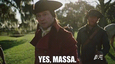 A Man In A Red Coat Says Yes Massa On A Screen GIF