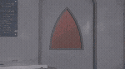 A Man In A Red Devil Costume Is Standing In A Room With The Words Mas E O Daemon Hein . GIF