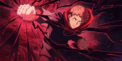 A Man In A Red Hoodie Is Holding A Fist In His Hand GIF