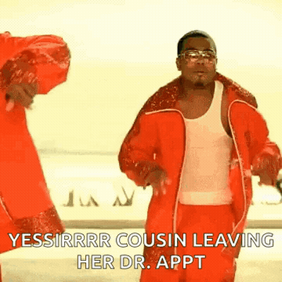 A Man In A Red Jacket And Red Pants Is Dancing With A Woman In A White Tank Top . GIF