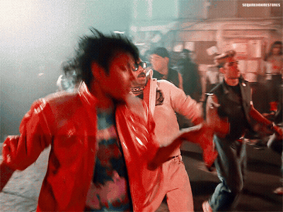 A Man In A Red Jacket Is Dancing With A Man In A White Shirt And A Man In A Black Jacket GIF