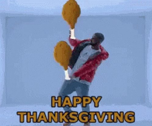 A Man In A Red Jacket Is Holding Two Fried Chickens In His Hands And Says Happy Thanksgiving On The Bottom GIF