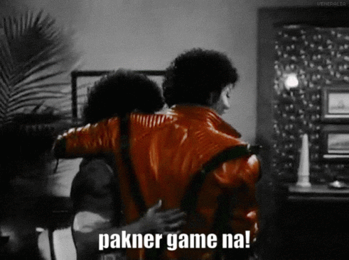 A Man In A Red Jacket Is Hugging Another Man With The Words Pakner Game Na On The Bottom GIF