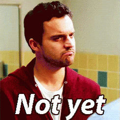A Man In A Red Jacket Is Making A Funny Face With The Words Not Yet Written Below Him GIF
