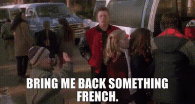 A Man In A Red Jacket Is Shaking Hands With A Girl In A Red Jacket . GIF