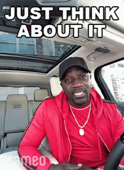 A Man In A Red Jacket Is Sitting In A Car With A Caption That Says Just Think About It . GIF