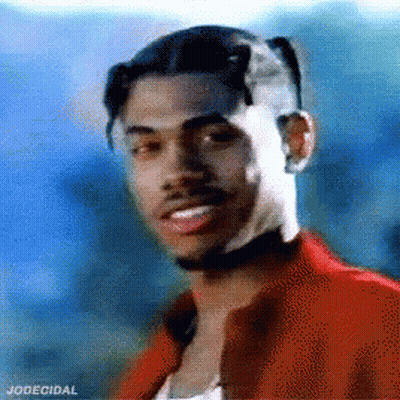 A Man In A Red Jacket Is Smiling And Has The Word Jodecidal On The Bottom Right GIF