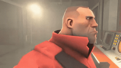 A Man In A Red Jacket Is Standing In Front Of A Control Panel . GIF