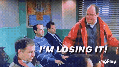 A Man In A Red Jacket Is Standing In Front Of A Group Of Men . GIF