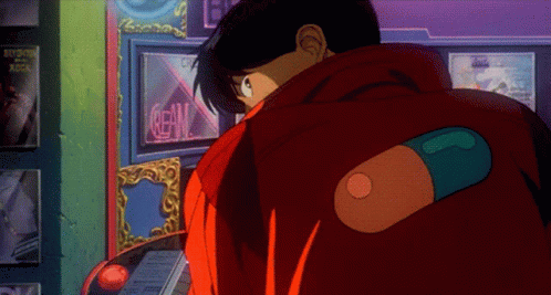 A Man In A Red Jacket Is Standing In Front Of A Neon Sign That Says Crew GIF