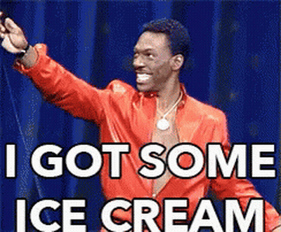 A Man In A Red Jacket Says " I Got Some Ice Cream " On A Stage GIF