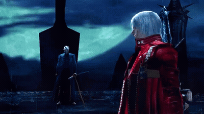 A Man In A Red Jacket Stands In Front Of A Man In A Blue Suit GIF