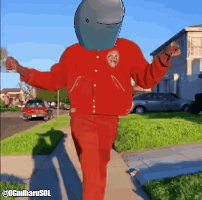 A Man In A Red Jacket With A Dolphin Head On His Head GIF