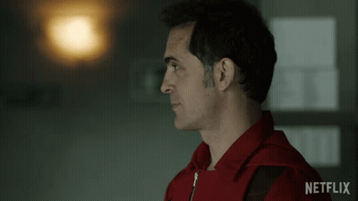 A Man In A Red Jacket With Netflix On The Bottom Right GIF