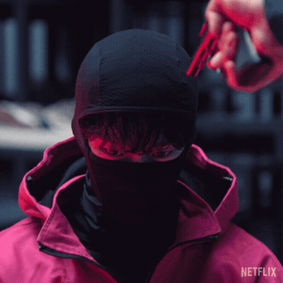 A Man In A Red Jacket With Netflix Written On The Bottom GIF