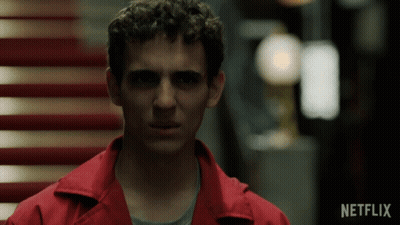 A Man In A Red Jacket With The Word Netflix On The Bottom Right GIF