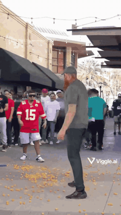 A Man In A Red Jersey With The Number 15 On It Stands In Front Of A Crowd Of People GIF