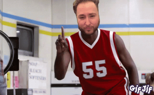 A Man In A Red Jersey With The Number 55 Giving The Middle Finger GIF