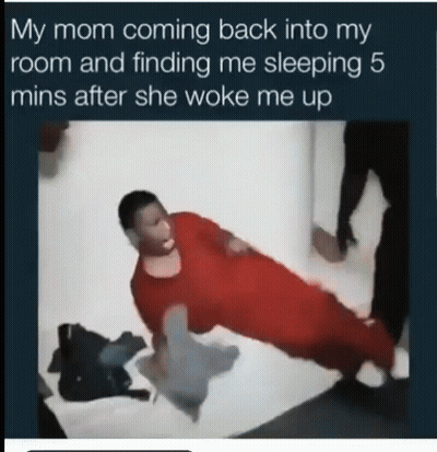 A Man In A Red Jumpsuit Is Doing A Plank Exercise GIF