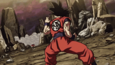 A Man In A Red Jumpsuit With A Chinese Symbol On His Chest GIF