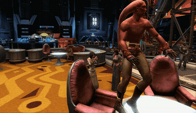 A Man In A Red Outfit Is Standing In A Room GIF