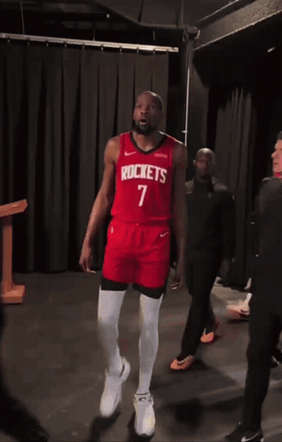 A Man In A Red Rockets Jersey With The Number 7 GIF
