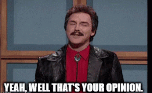 A Man In A Red Shirt And Black Jacket Says Yeah Well That 'S Your Opinion . GIF