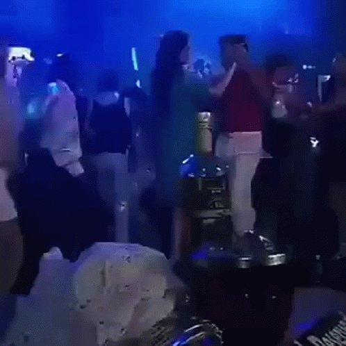 Man Dancing In Red Shirt And White Pants GIF