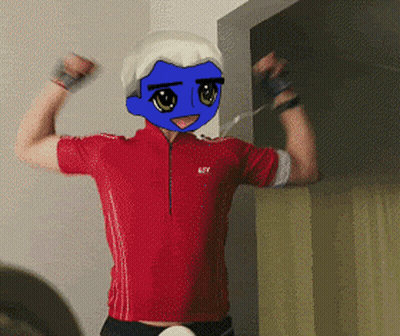 A Man In A Red Shirt Has A Blue Face On His Face GIF