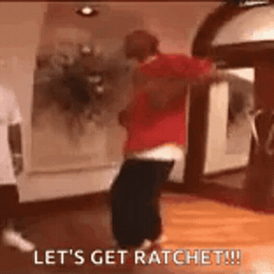A Man In A Red Shirt Is Dancing On A Wooden Floor With The Words `` Let 'S Get Ratchet ! '' GIF