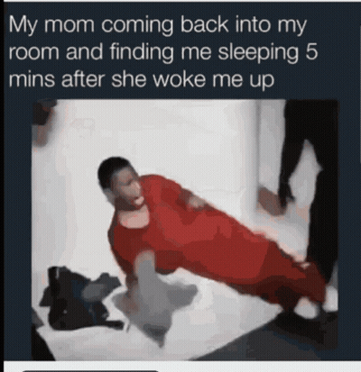 A Man In A Red Shirt Is Doing A Plank On A Bed With The Caption My Mom Coming Back Into My Room GIF