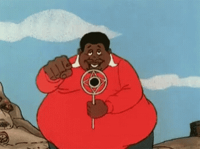 A Man In A Red Shirt Is Holding A Circular Object In His Hands GIF