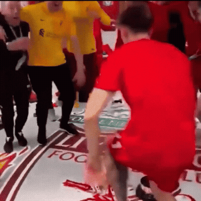 A Man In A Red Shirt Is Kneeling Down In Front Of A Sign That Says Fog On It GIF