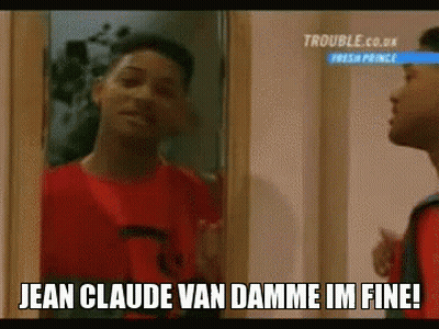 A Man In A Red Shirt Is Looking At Himself In A Mirror And Saying Jean Claude Van Damme Im Fine ! GIF