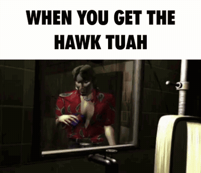 A Man In A Red Shirt Is Looking At Himself In A Mirror With The Caption When You Get The Hawk Tuah GIF