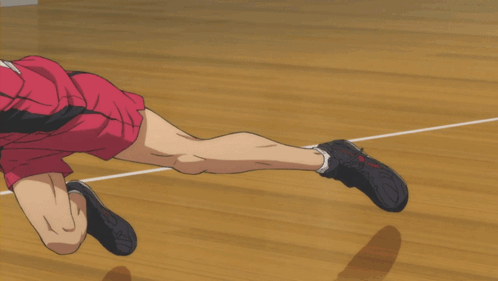 A Man In A Red Shirt Is Playing Volleyball With A Yellow Ball GIF