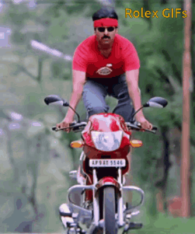A Man In A Red Shirt Is Riding A Red Motorcycle With A License Plate That Says Lp943t 5546 GIF