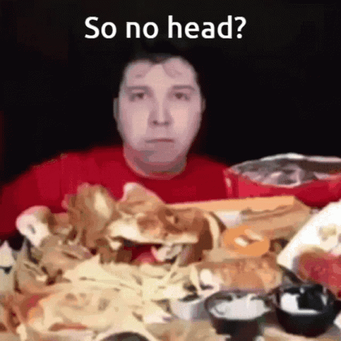 A Man In A Red Shirt Is Sitting At A Table Full Of Food With The Words So No Head Written On The Bottom GIF