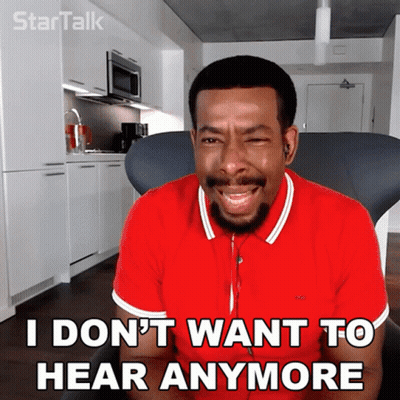 A Man In A Red Shirt Is Sitting In A Chair And Says I Do N't Want To Hear Anymore GIF