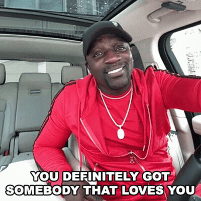 A Man In A Red Shirt Is Sitting In The Back Seat Of A Car With The Words You Definitely Got Somebody That Loves You Belo GIF