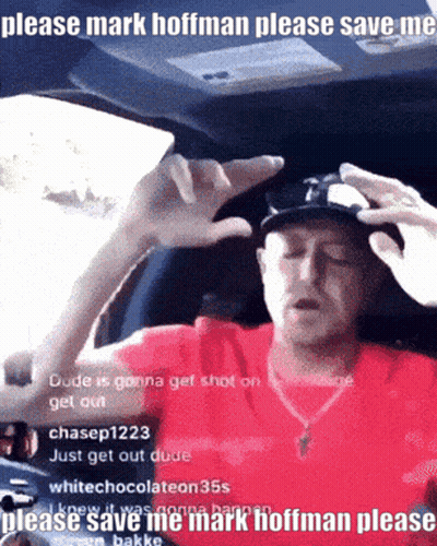 A Man In A Red Shirt Is Sitting In The Driver 'S Seat Of A Car Asking For Help GIF